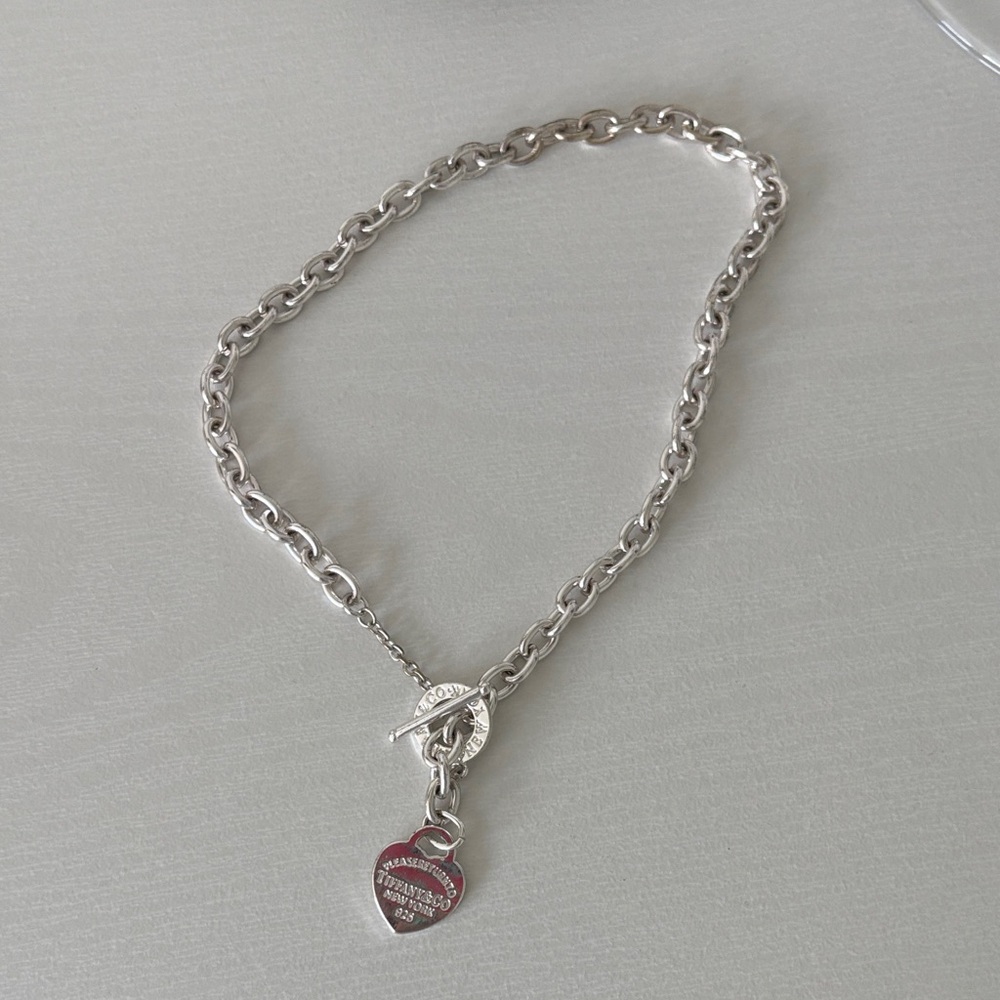 Tiffany & Co. Silver Bracelet with Red Heart Charm